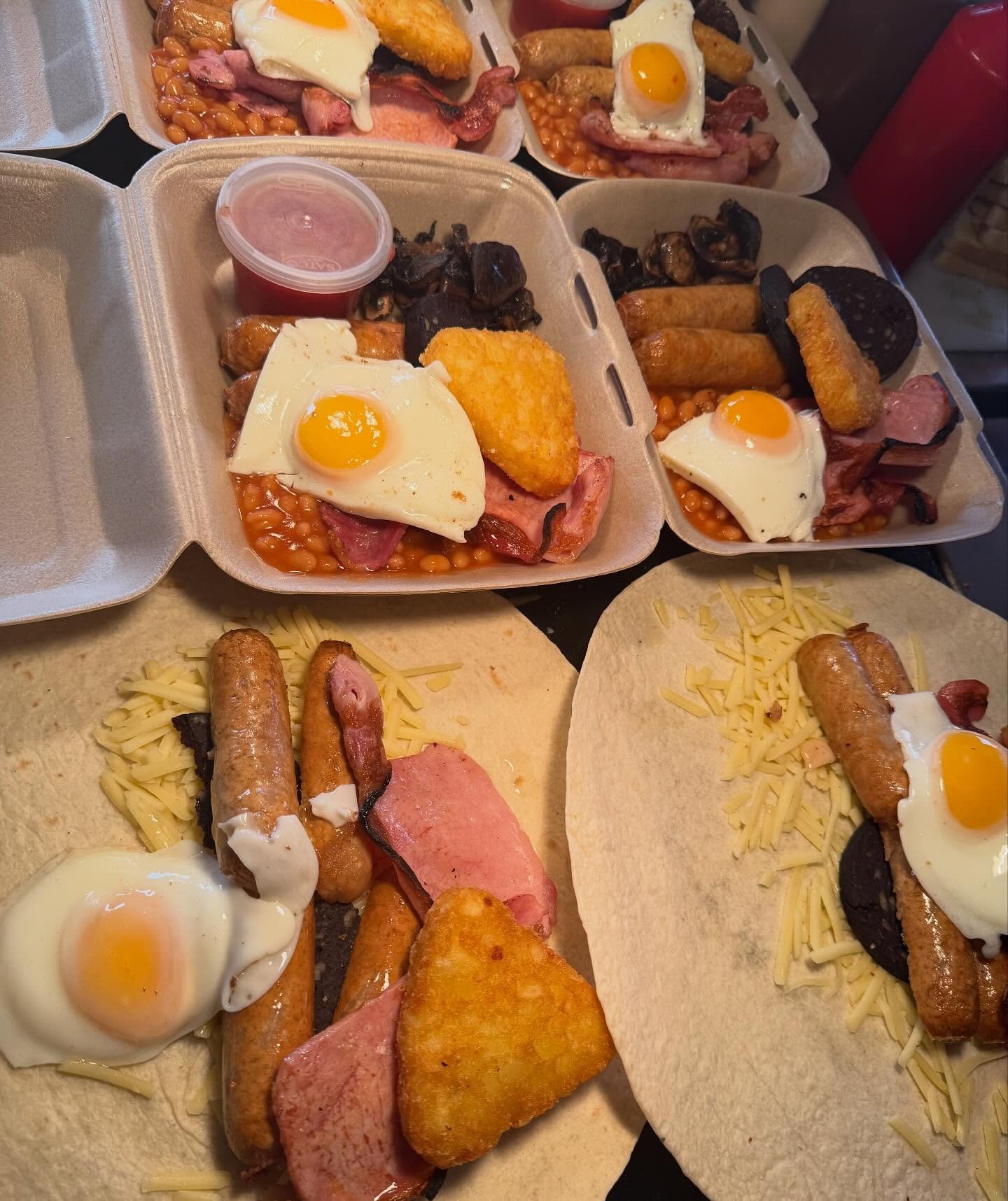 Breakfast boxes and cheesy breakfast wraps being prepared at The Oven Door Cafe, Haydock, St Helens